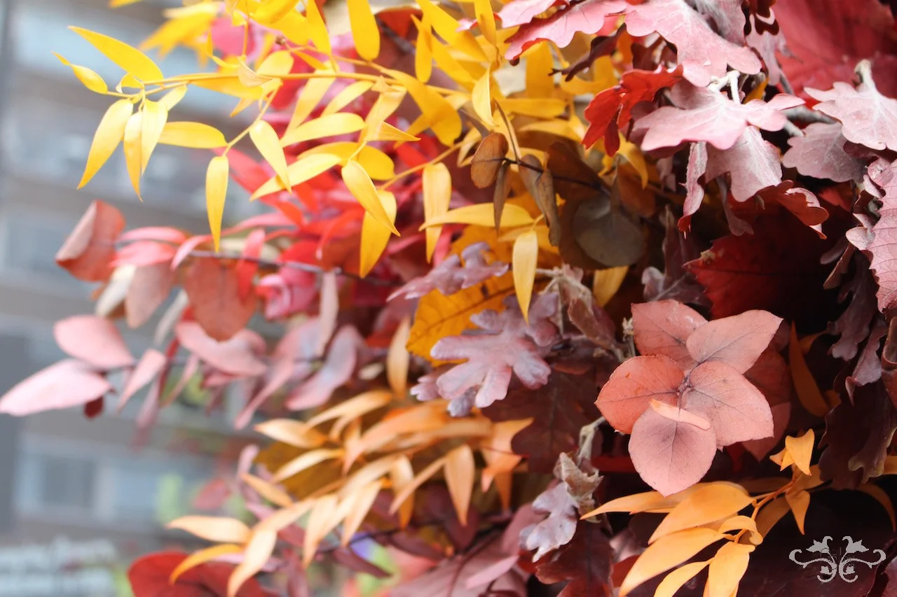 Autumn leaves styled for an impressive urn arrangement