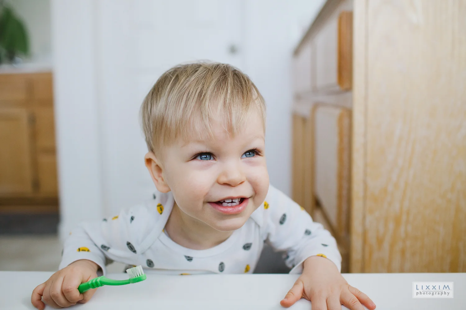 brushing-teeth-15-month-old-toddler-bathroom-kid.jpg