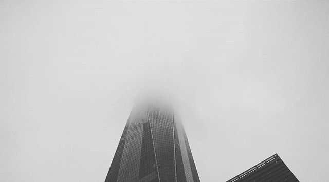 One World Trade Center disappearing into the fog #nyc