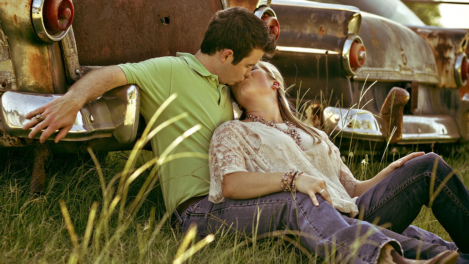 Vintage engagement photo with old cars