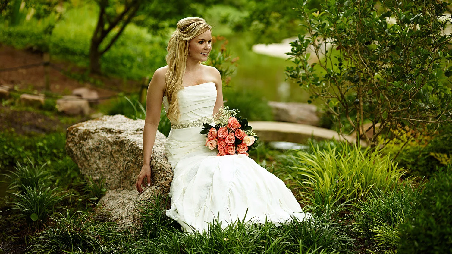 Beautiful bridal photo at Hermann Park with flower bouquet.