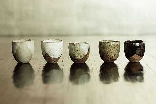 Sake Cups, they appear to float on the surface of the lacquered table. The wall behind is also lacquered, on top of real silver leaf. 