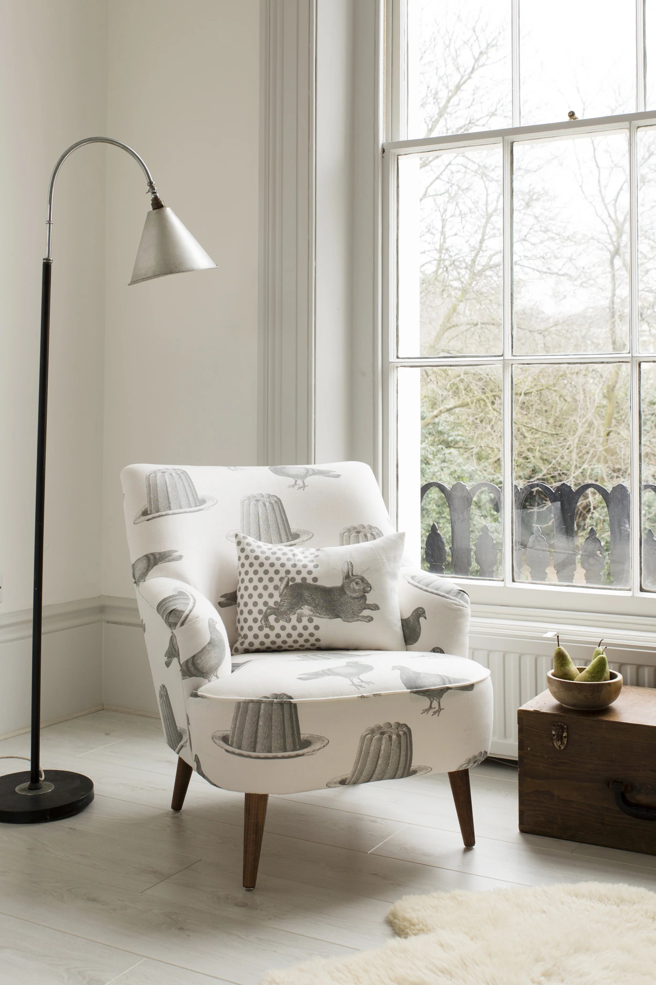 Chair to side of right window into far corner of studio