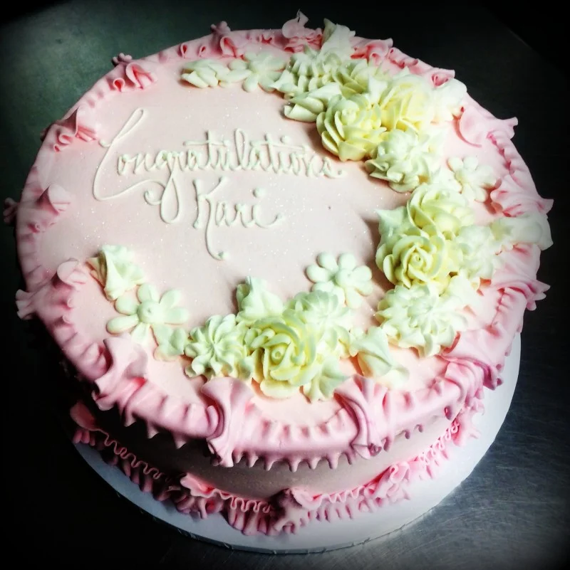 Pink Round Cake with White Roses