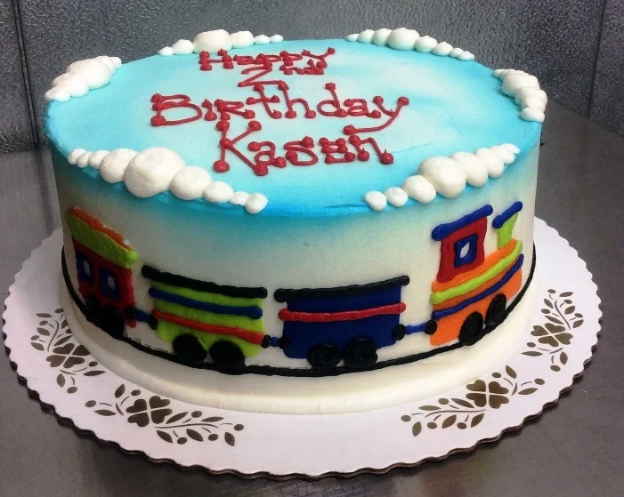 Round Cake with Piped Train on Side