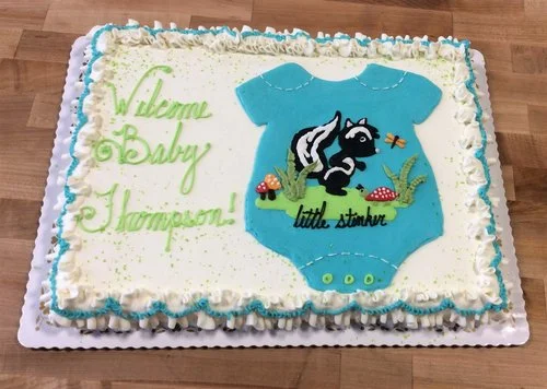 Baby Shower Sheet Cake with Piped Skunk and Onesie