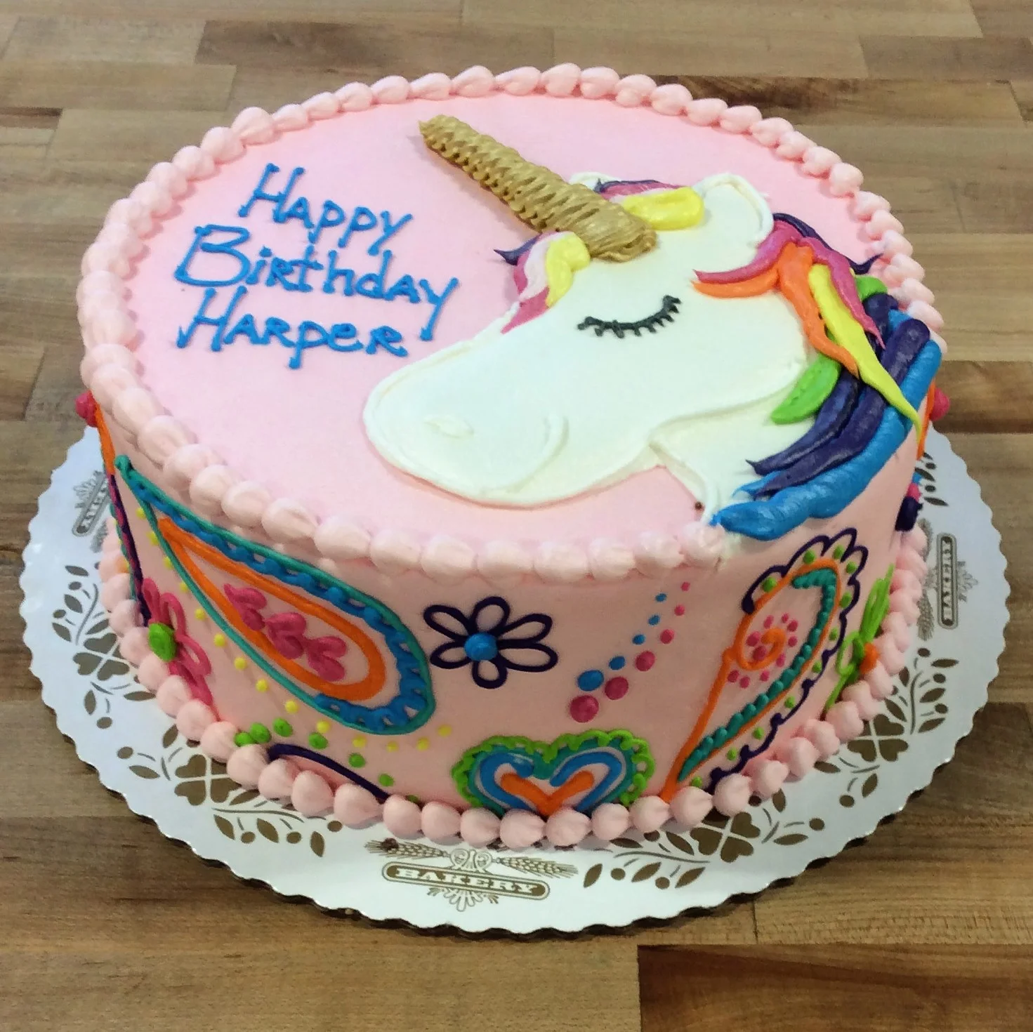 Pink Cake with Unicorn and Paisley Decorations