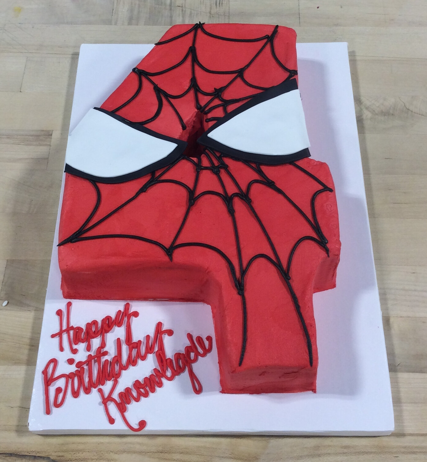 4 shaped Spiderman Cake.jpeg