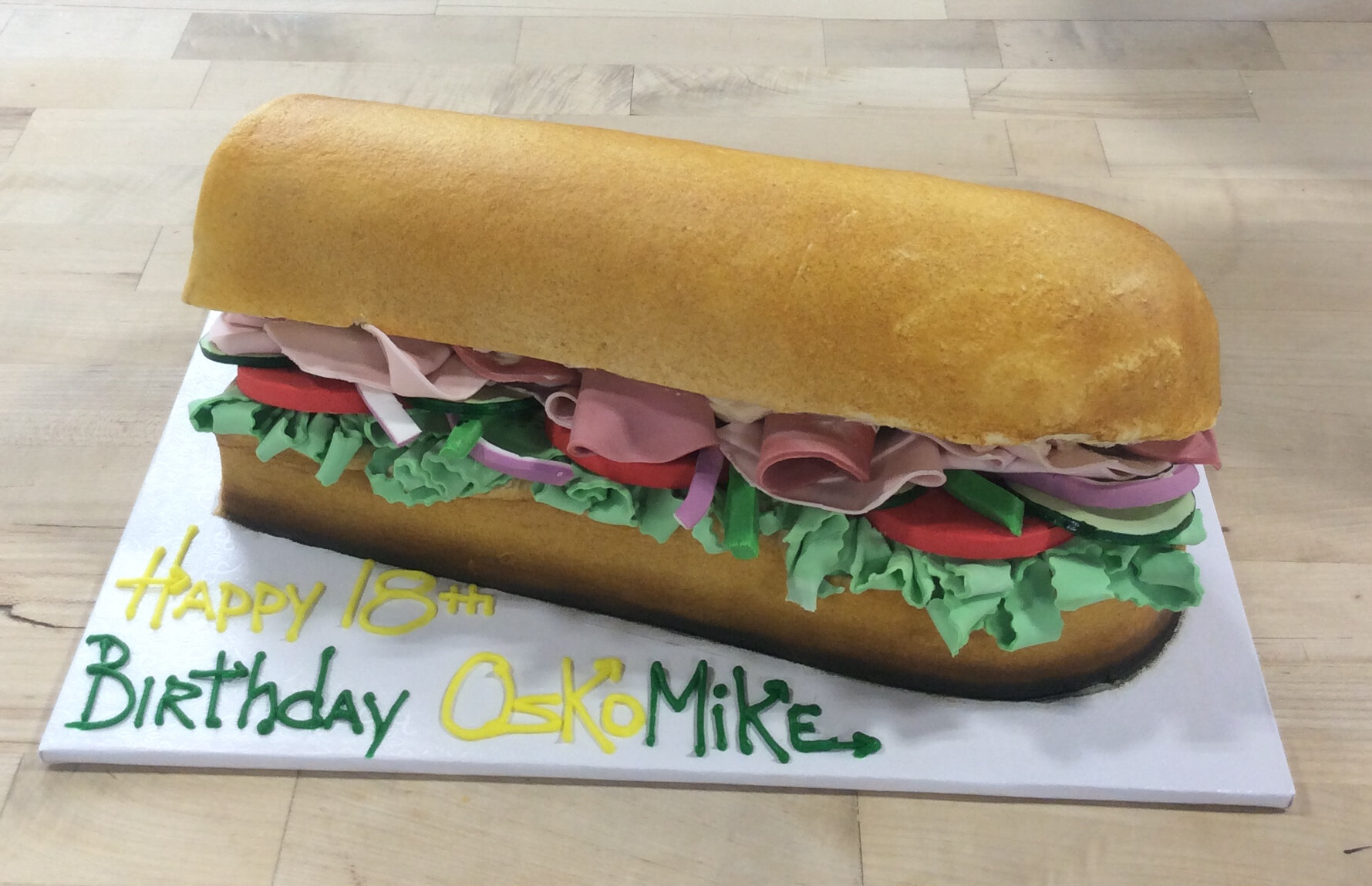 Subway Sandwich Shaped Cake.jpeg