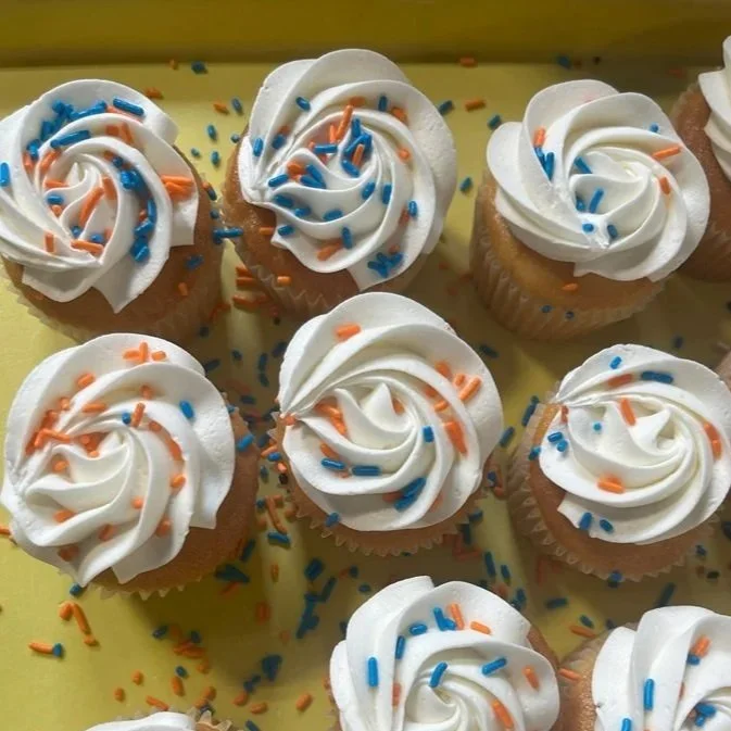 Graduation White Iced Cupcakes with Sprinkles