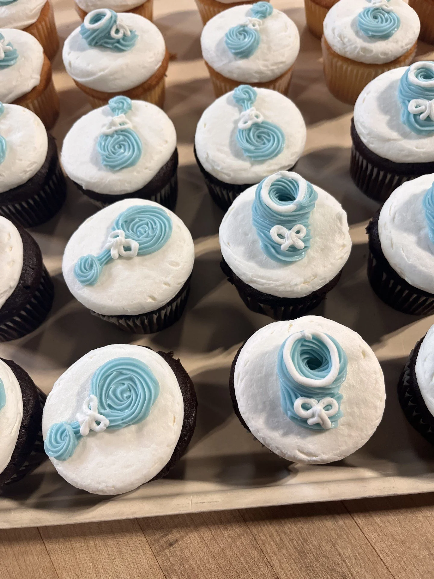 Cupcakes with Baby Booties and Rattles