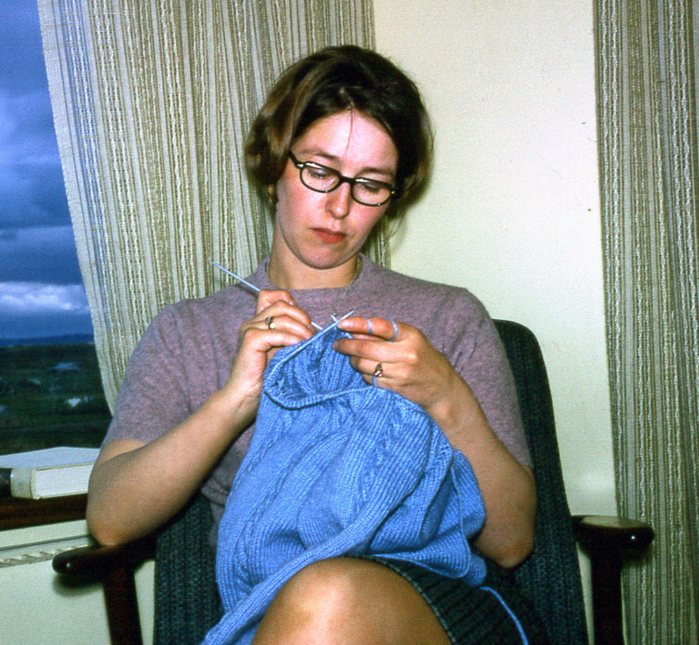 My mother sitting in her favourite knitting chair by the window in my childhood home