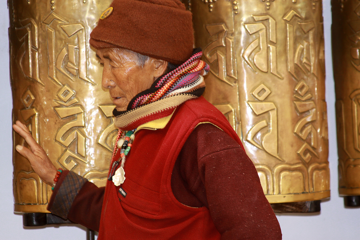 Website Dharmsala man and prayer wheel.jpg