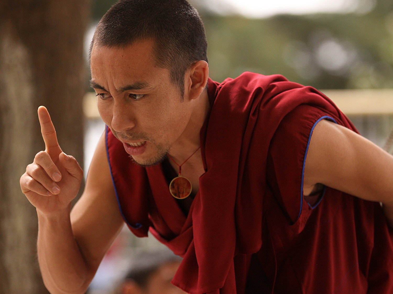 Website Dharmsala debating monk with finger.jpg