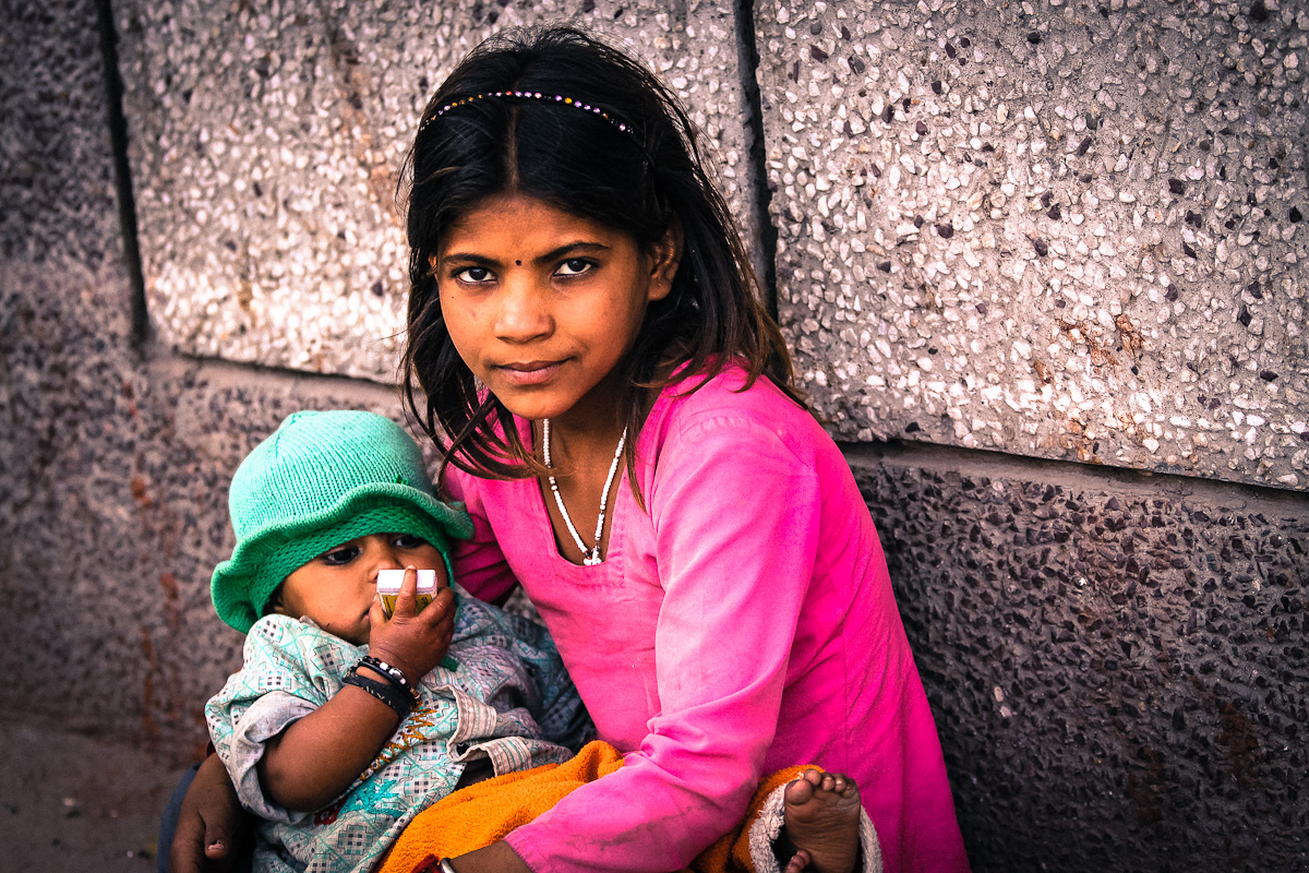 children Muslim girl with baby Jama Masjid.jpg