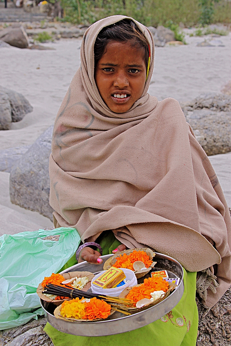 children young girl selling Ganga Rishikesh.jpg