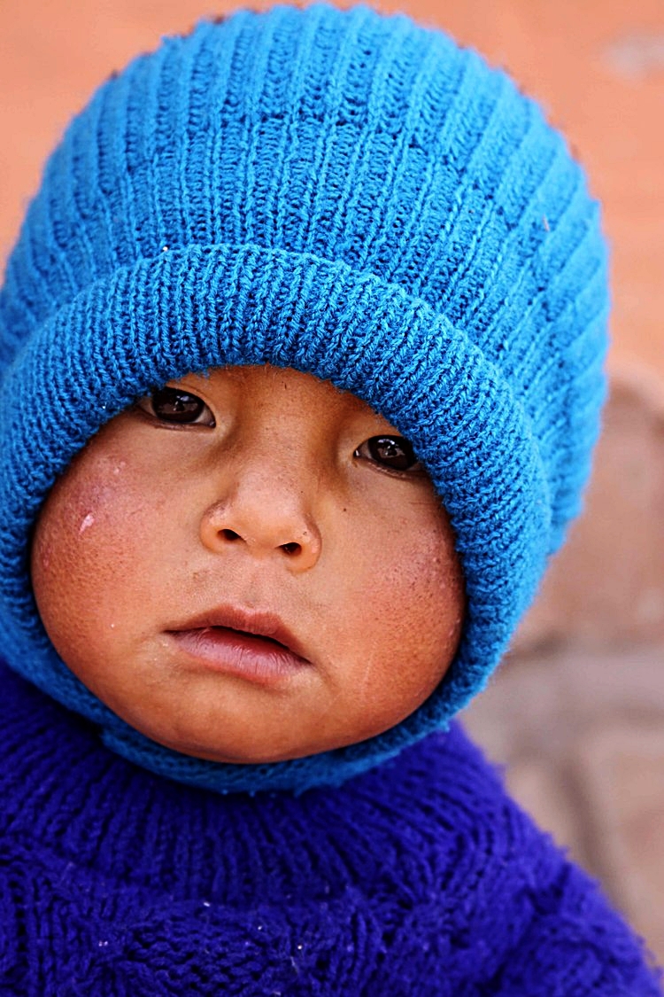 Peru W little boy in blue.jpg