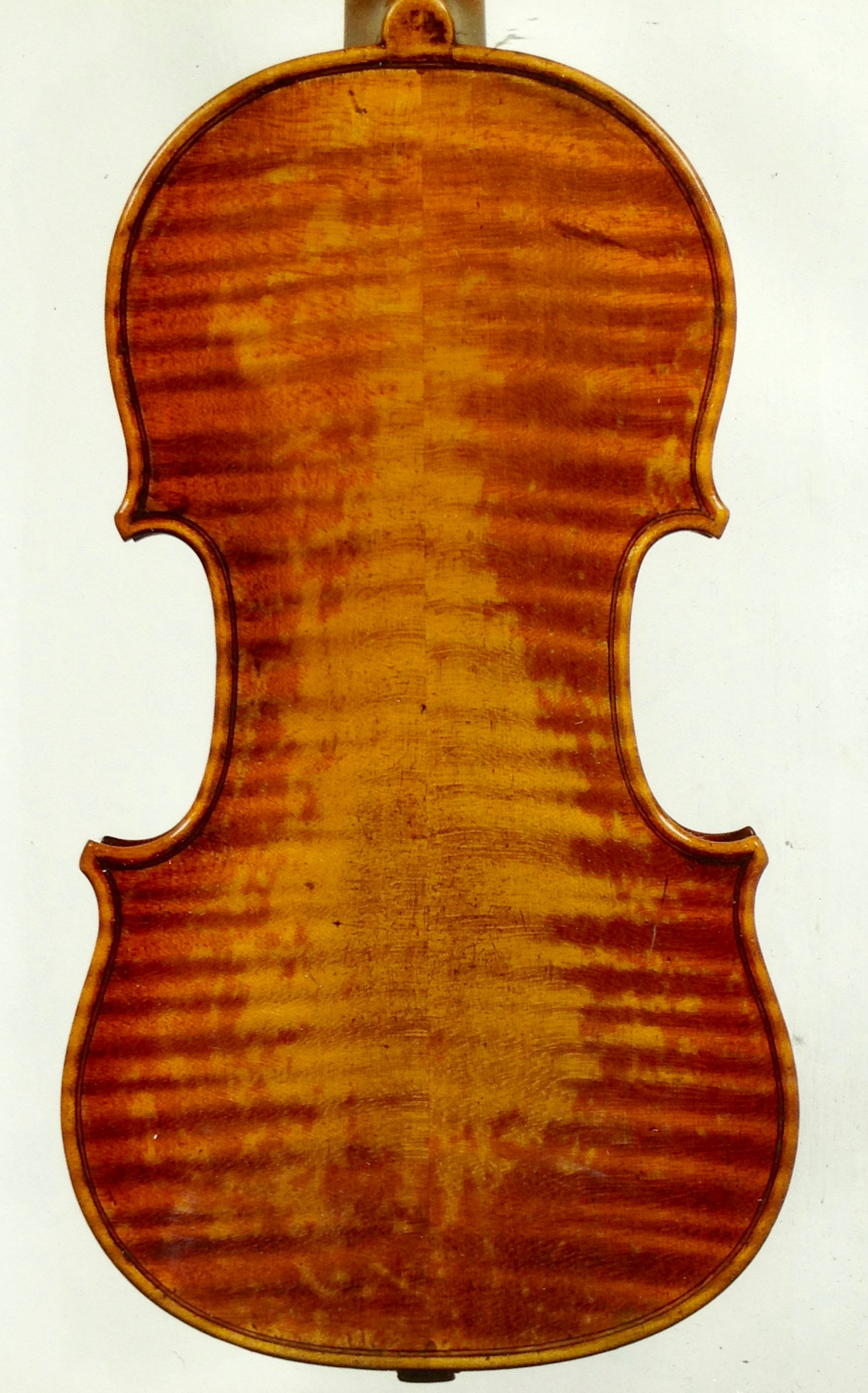 The back of a Stradivari violin. The natural wear of the varnish creates a gorgeous patina that can't be reproduced artificially.