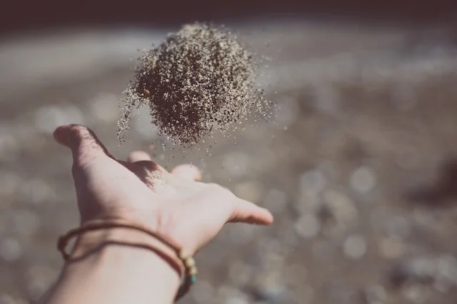 Hand Holding Black Ball.jpg
