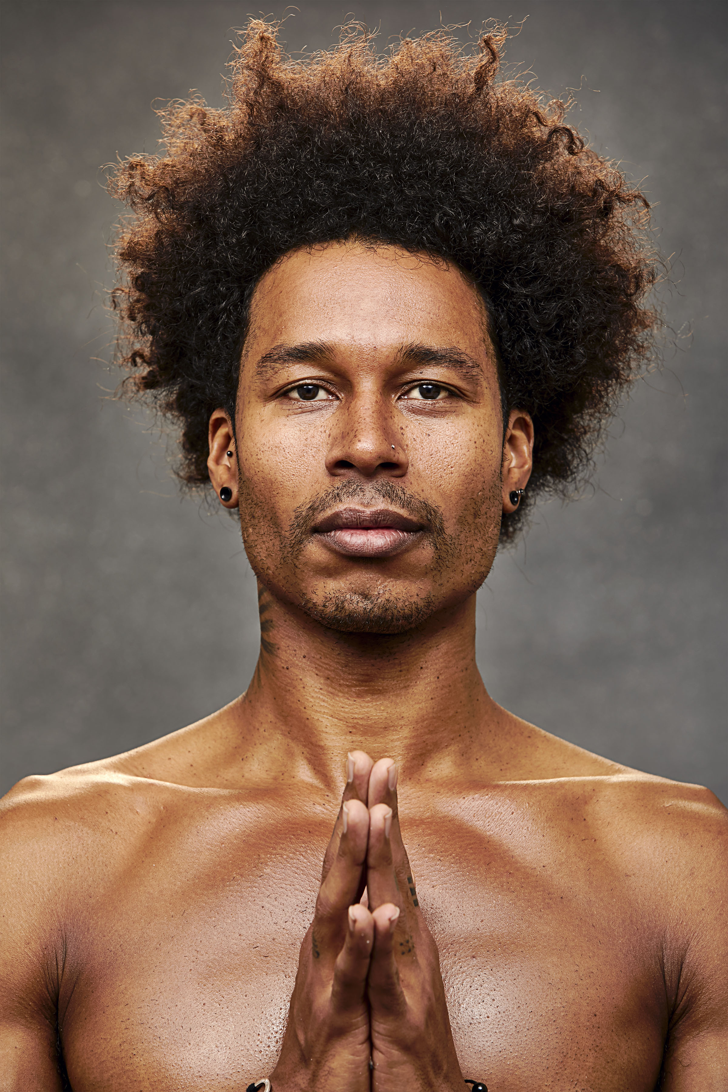 Yoga gurus Kate Lister - wearing Lulu Lemon - and Marc Laws in Studio in london. Sports Photography.