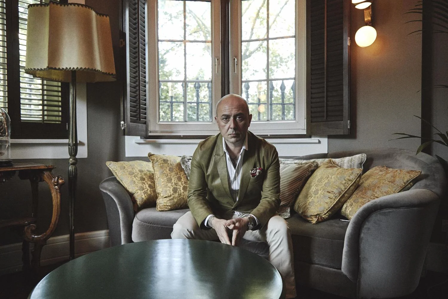  Tattoo artist Mo Copolletta. Menswear on location in London. 