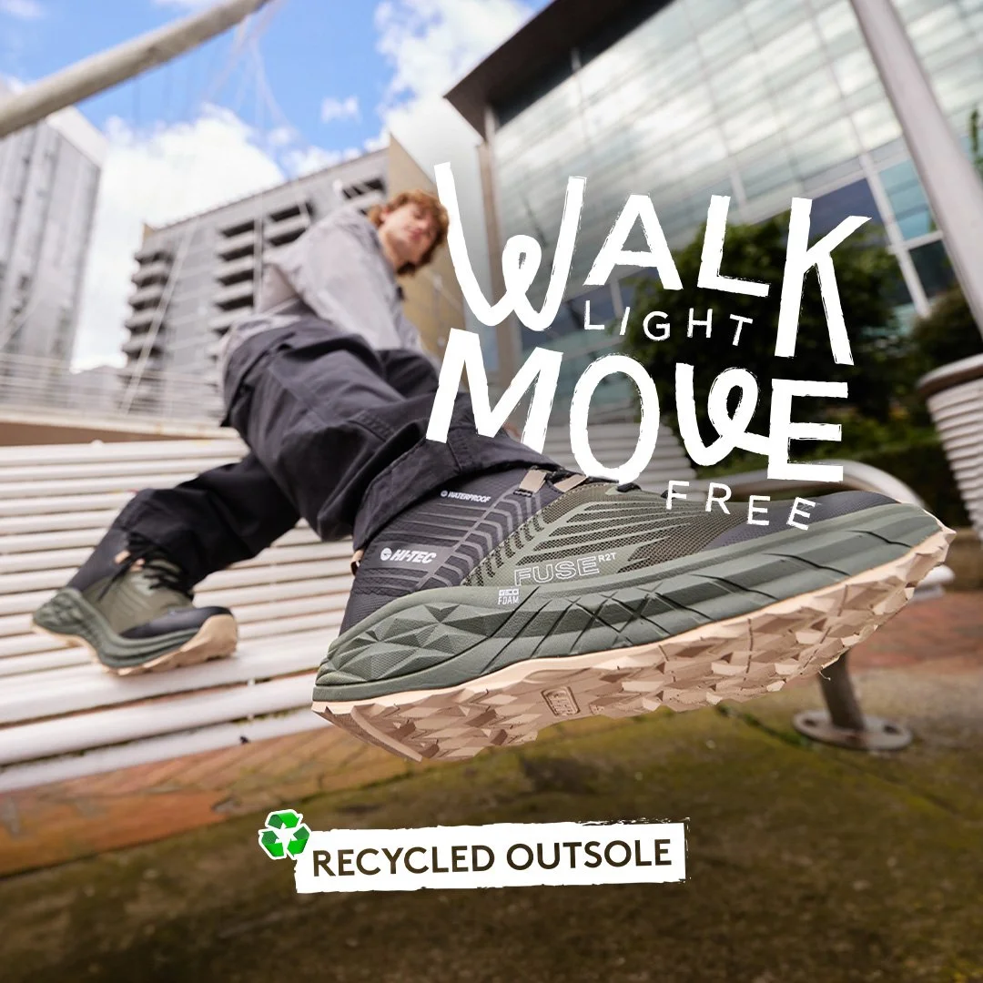Close-up of a person walking on stairs wearing hiking shoes with a message promoting eco-friendly footwear, emphasizing recycled outsoles and being walker light, mouse free.