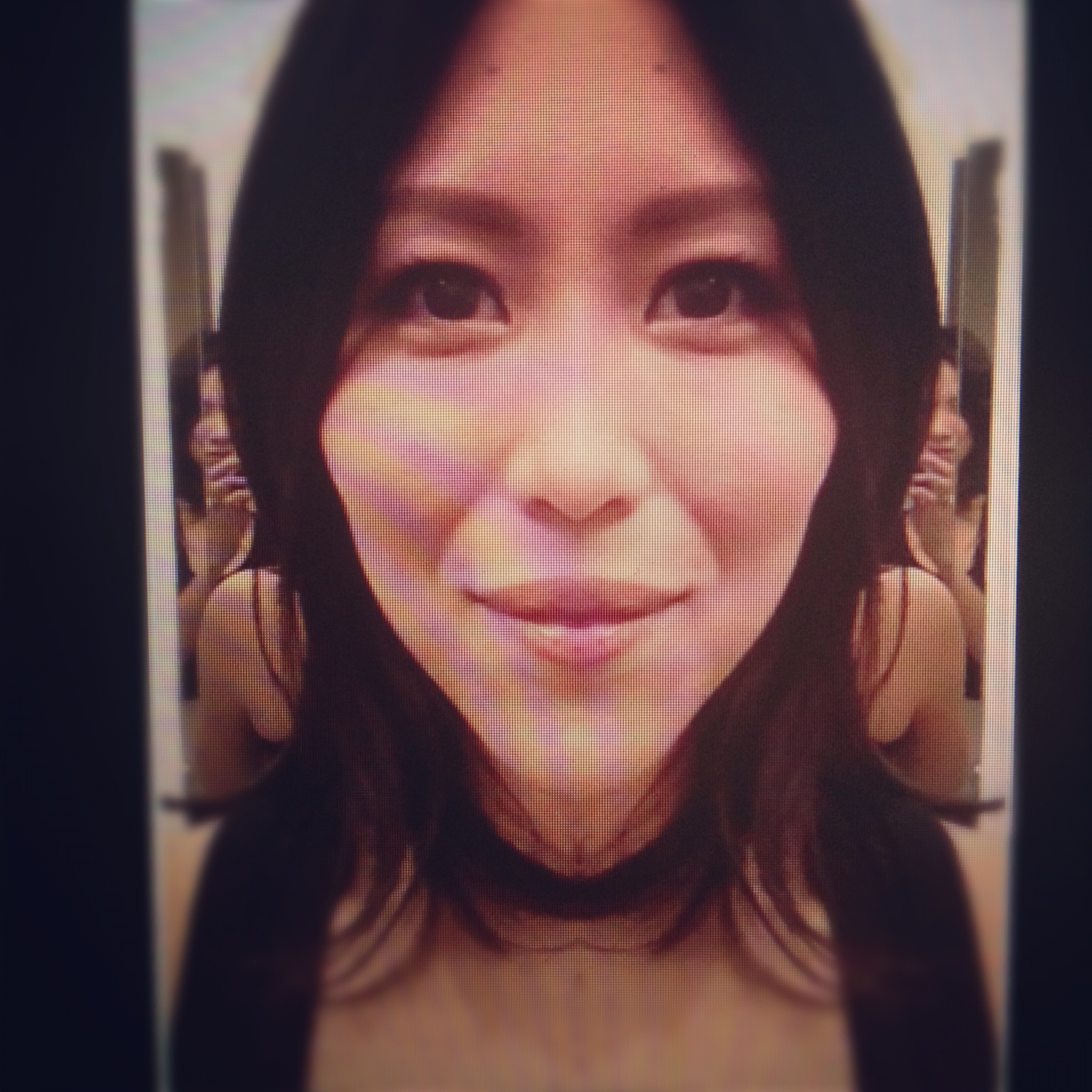 A pic of me, using the Echoism app, which takes each side of your face and flips it to create two perfectly symmetrical wholes. This is just one of the two. Bizarre, I know.