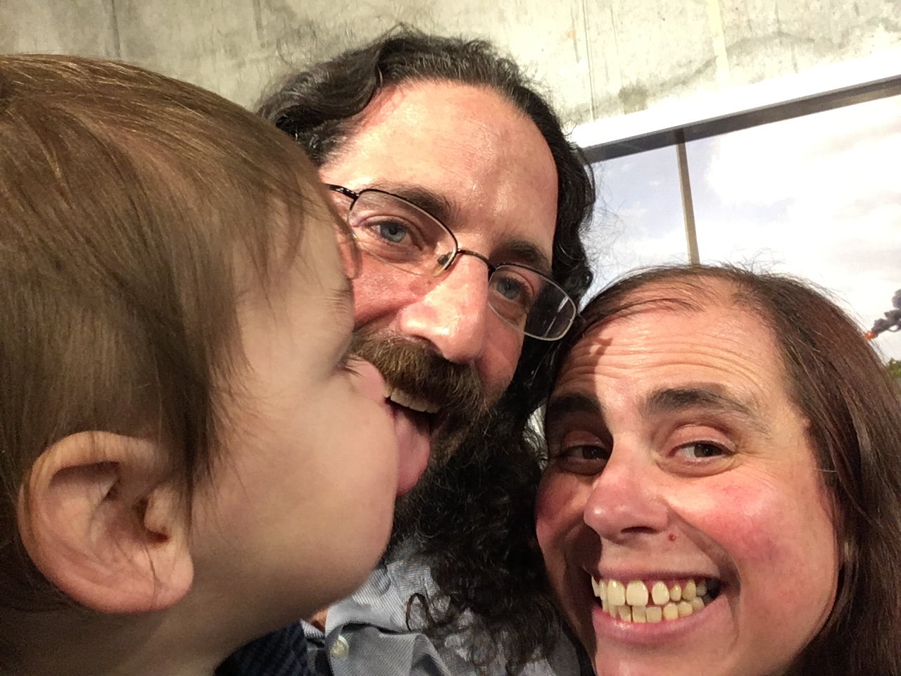 Allison Landa with her husband Adam and son Baz.