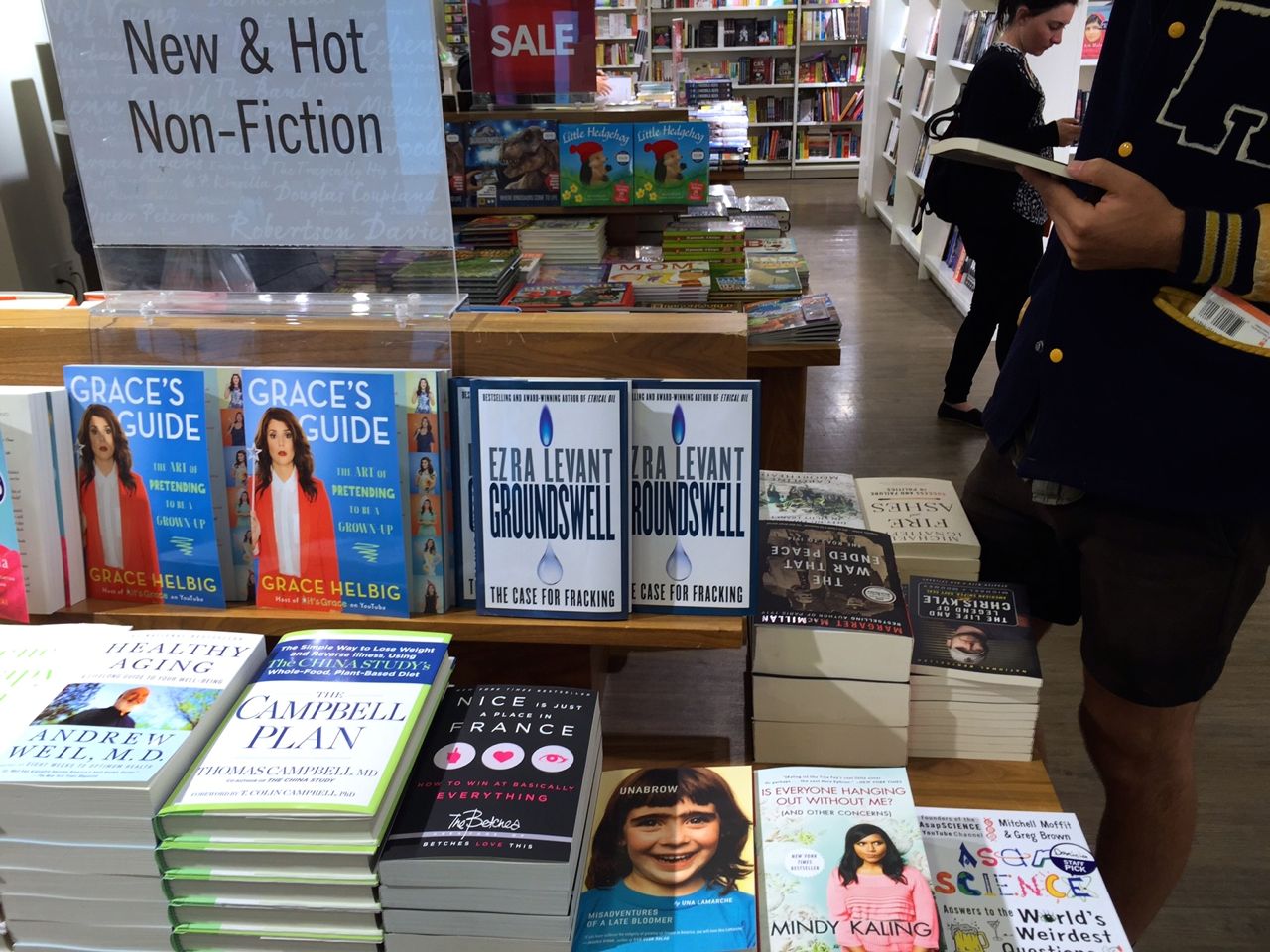 Smart and very funny friend-of-friends blogger Una Lamarche's book UNABROW (above, blue shirt) was right there on the NEW & HOT table in the bookstore on Stephen Avenue. 