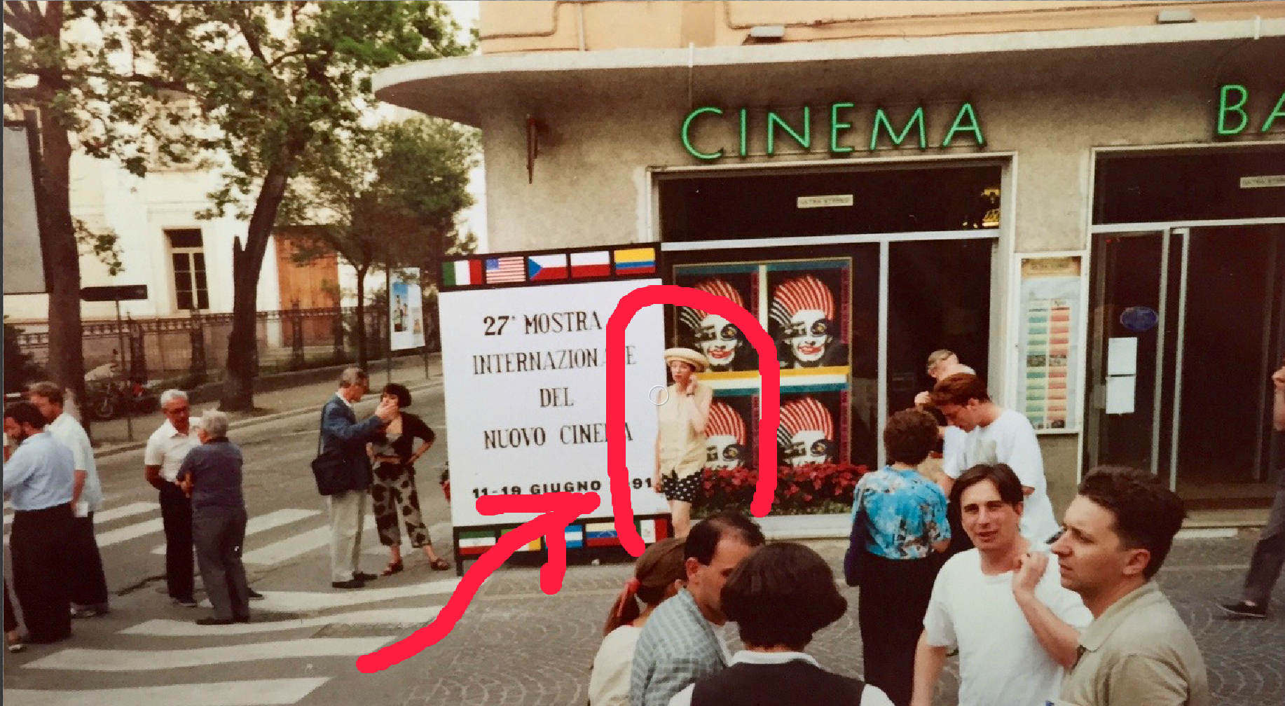Here I am posing in front of the festival posters and the cinema in Pesaro where the screenings took place.