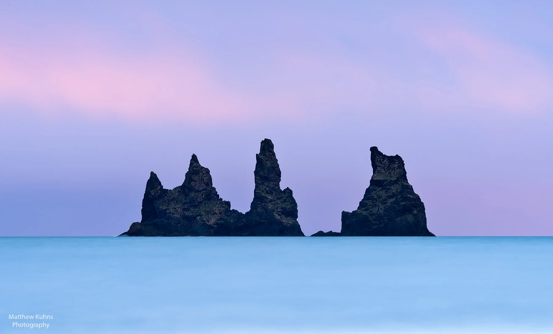 Click to Enlarge. The black sea stacks at Vik.