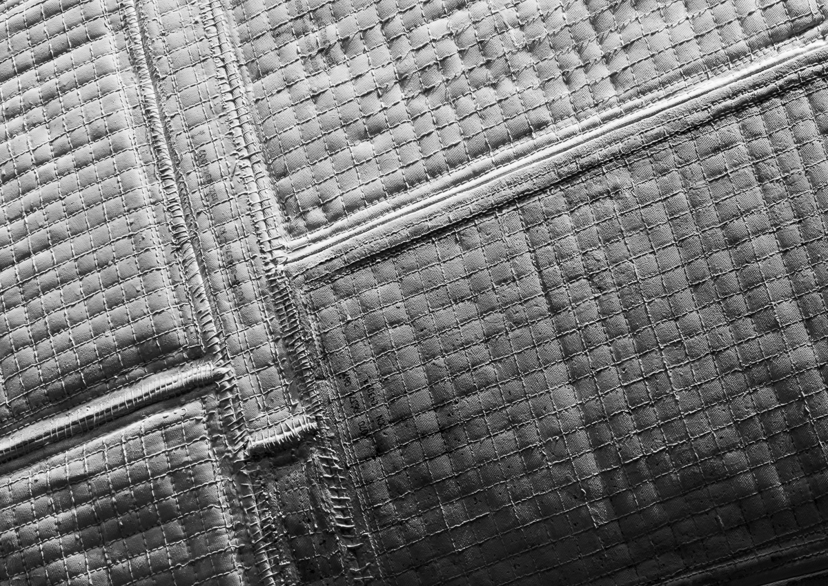 Thermal blankets over the OMS engine pod. The blankets were hand stitched together to prevent fraying around the edges from aerodynamic buffeting.