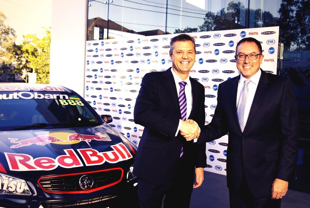  V8 Supercars CEO James Warburton and Fox Sports CEO Patrick Delany shake hands to the new broadcast deal. 