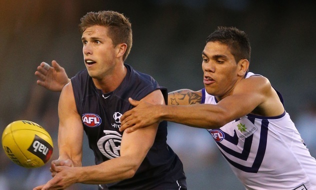  The Fremantle Dockers take on Carlton when Thursday Night Football returns tonight. image copyright - Getty 