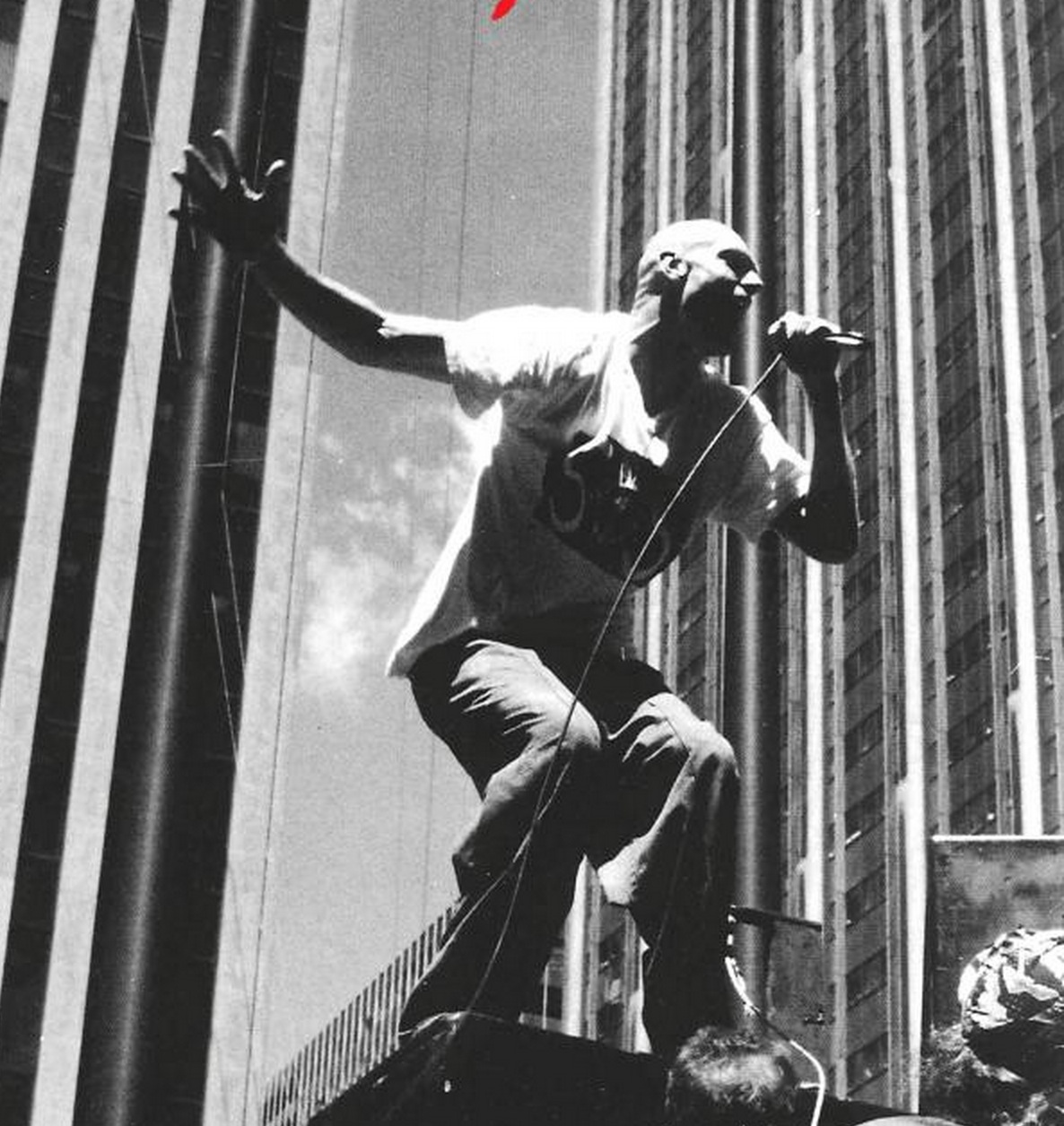     Midnight      Oil in the shadow of Exxon Oil’s skyscraper headquarters in New York City.  image source - MidnightOil.com    