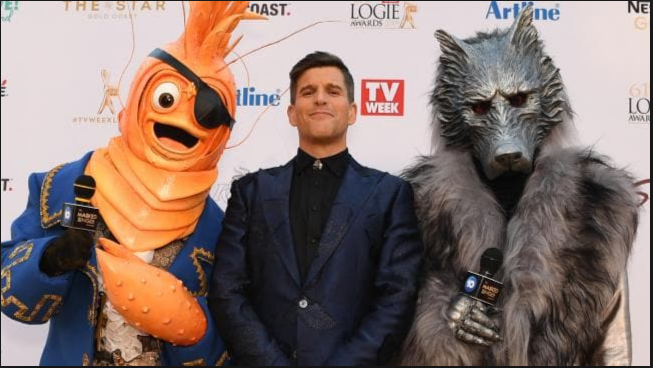   Osher Günsberg  ,  host of  The Masked Singer  with some of the costumes to be used on the Australian series  PHOTO: news.com.au 