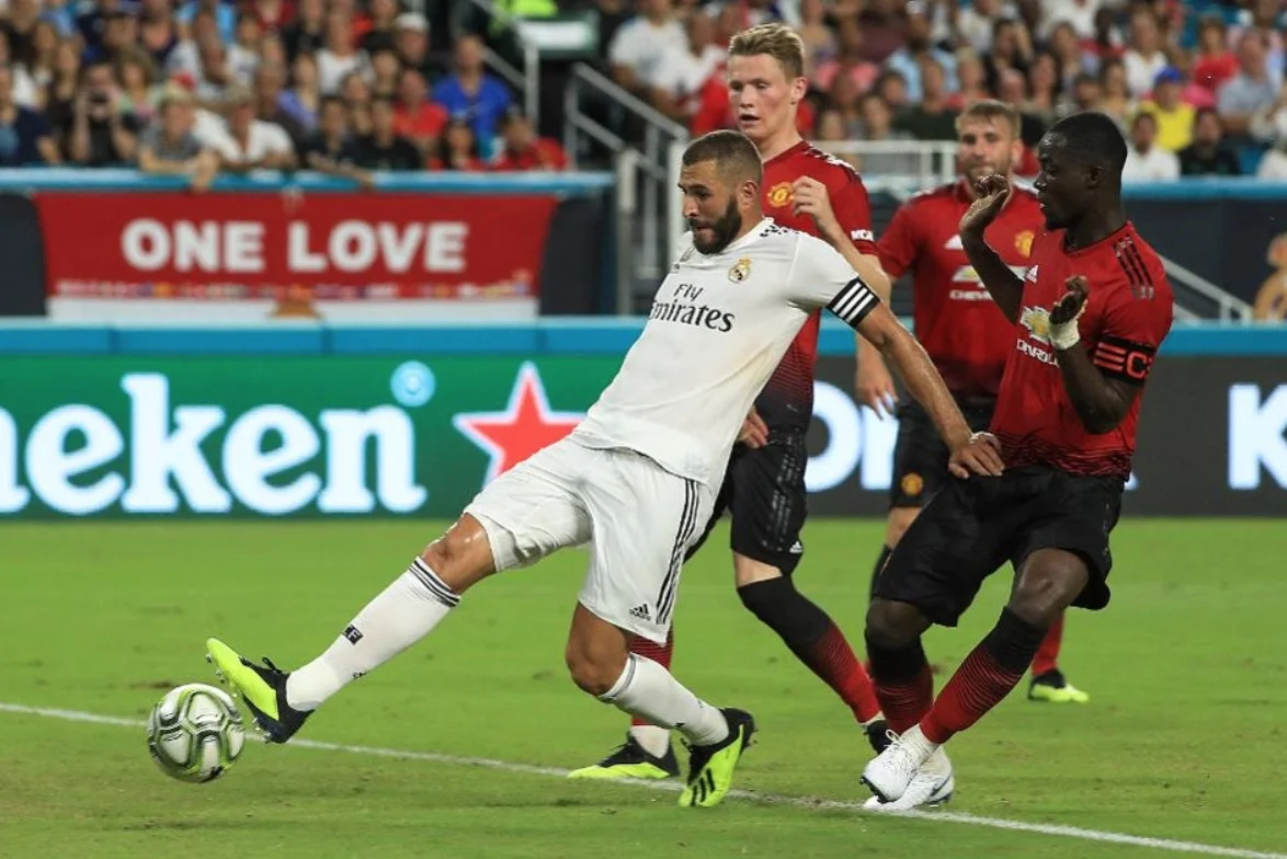 Karim Benzema #9 of Real Madrid scores a goal against Manchester United image - Getty