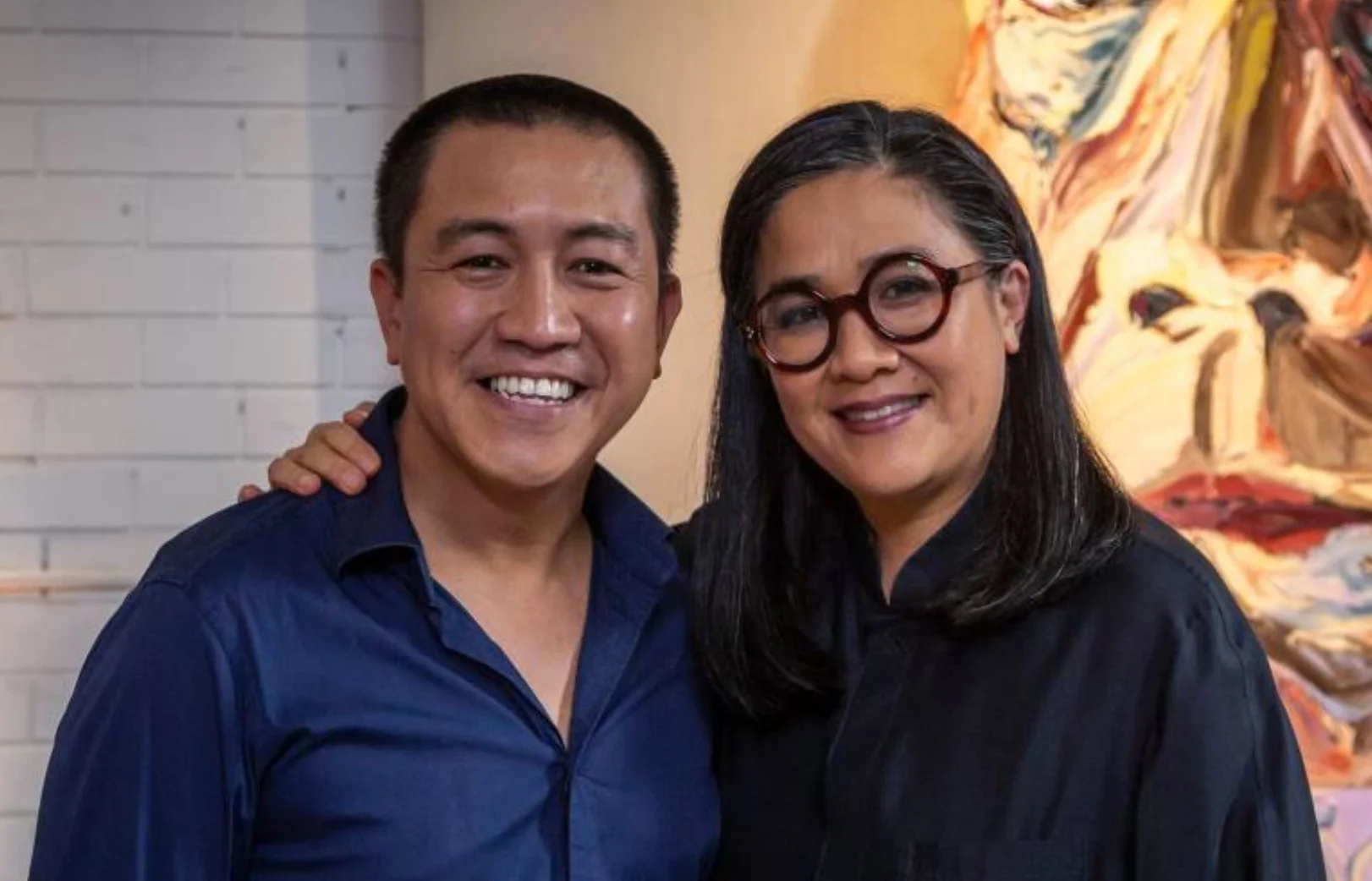 Kylie Kwong wearing her round red glasses on Anh’s Brush With Fame image - ABC