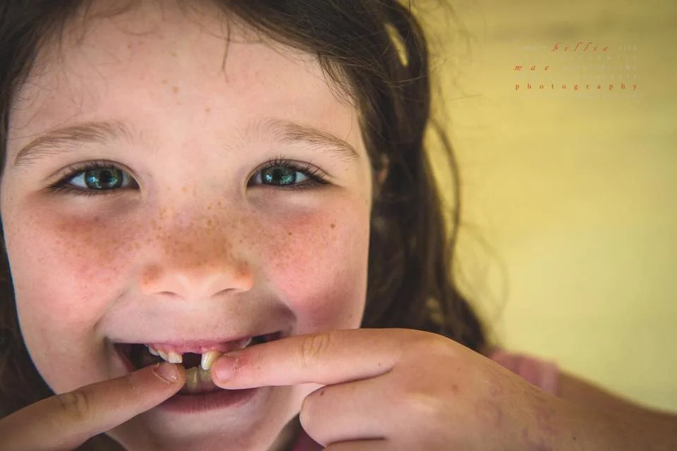 "empty" space ready for a big girl tooth!