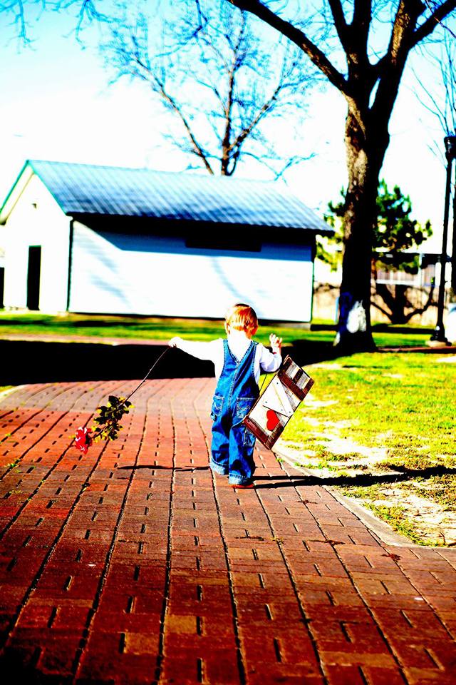 Love: I am in love with this photo of Anthony. He took his flower and love sign waved and said bye bye mommy and continued down the path. Then I asked for a hug. He dropped everything and ran back for a hug. Mary Weber Bunevich