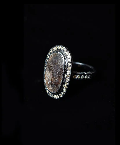 Black-Oval-Diamond-RIng-7ct-Main-Diamond-6.8ct-Diamonds-Surrounding-Ring-and-on-Shank-Silver-with-Black-Rhodium-Finish.jpg