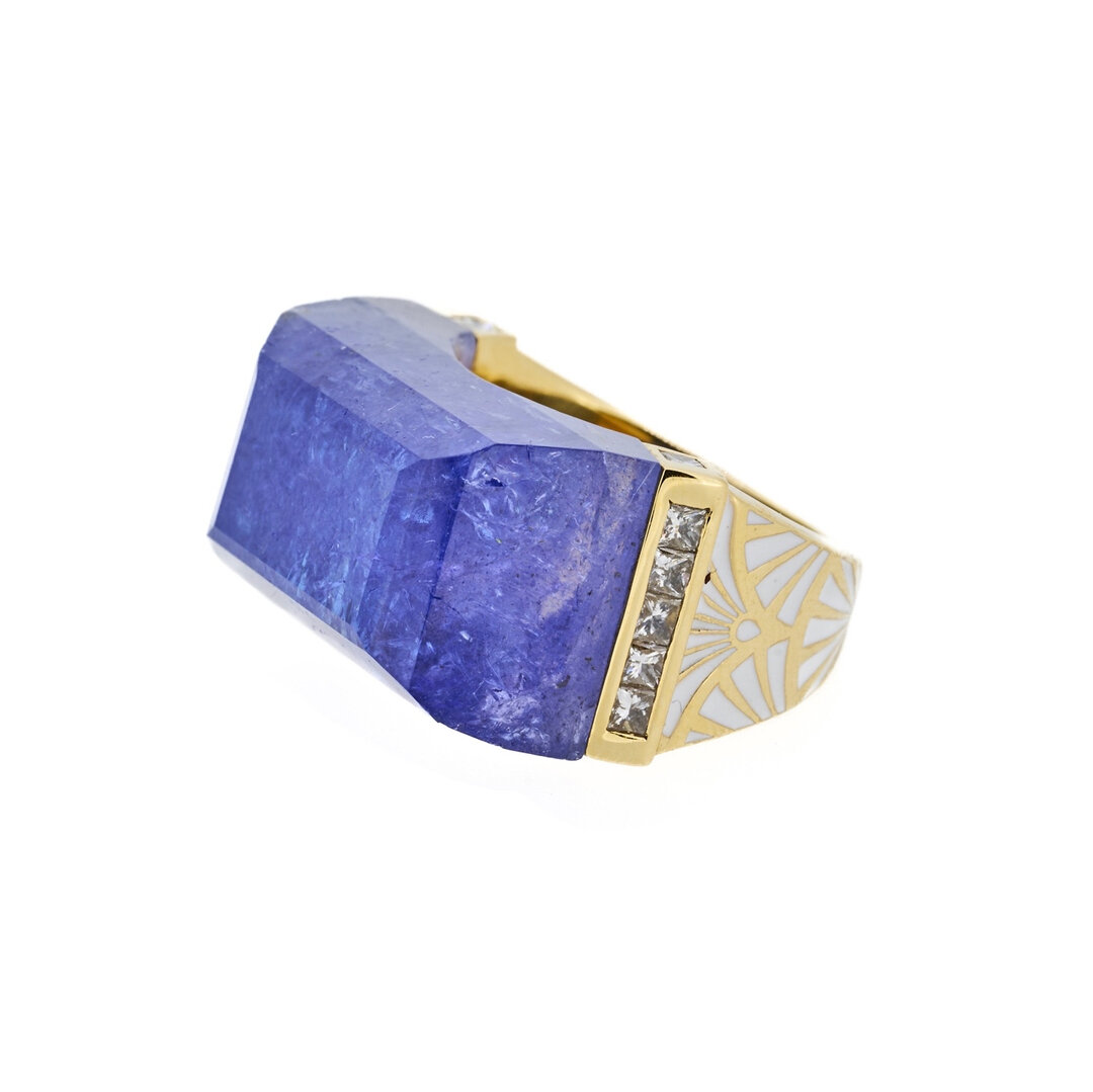Tanzanite Neverending ring with diamonds and white enamel in 18k yellow gold​​​​​​​​
​​​​​​​​
For all enquires please email us at sales@jadejagger.com
