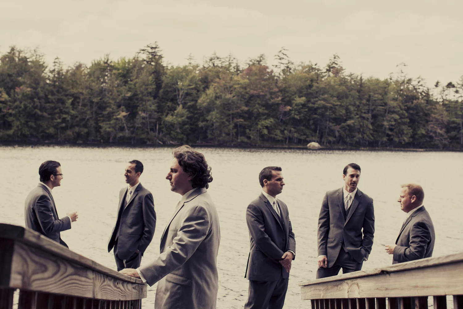 Mamie & Louis - Woodgate, NY - What can I say, I love groomsmen group shots. Sometimes I do them and they feel pretty staged and sometimes they feel too casual. I think what I love about this is that it looks super staged with Louis facing straight left, but also casual with the guys on the dock in the background. It's a nice combo, real & fake, stiff and relaxed. I also am fond of the railing leading down and the shore line across the lake just above their heads and the tree line above that. It really sets the photo into 1/3s. Loved getting to hangout with Louis before the wedding. Not sure I've seen a groom quite so nervous before the wedding though!