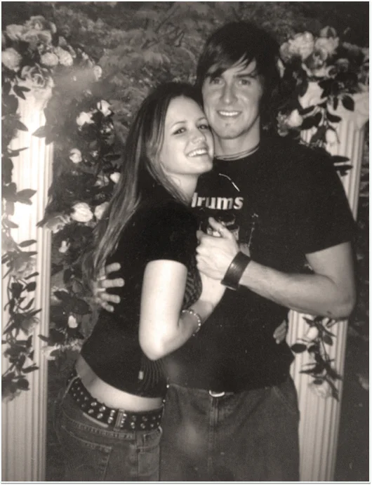 Our official wedding photo. Doesn't this make you want to hire a professional? And maybe buy a new band t-shirt?