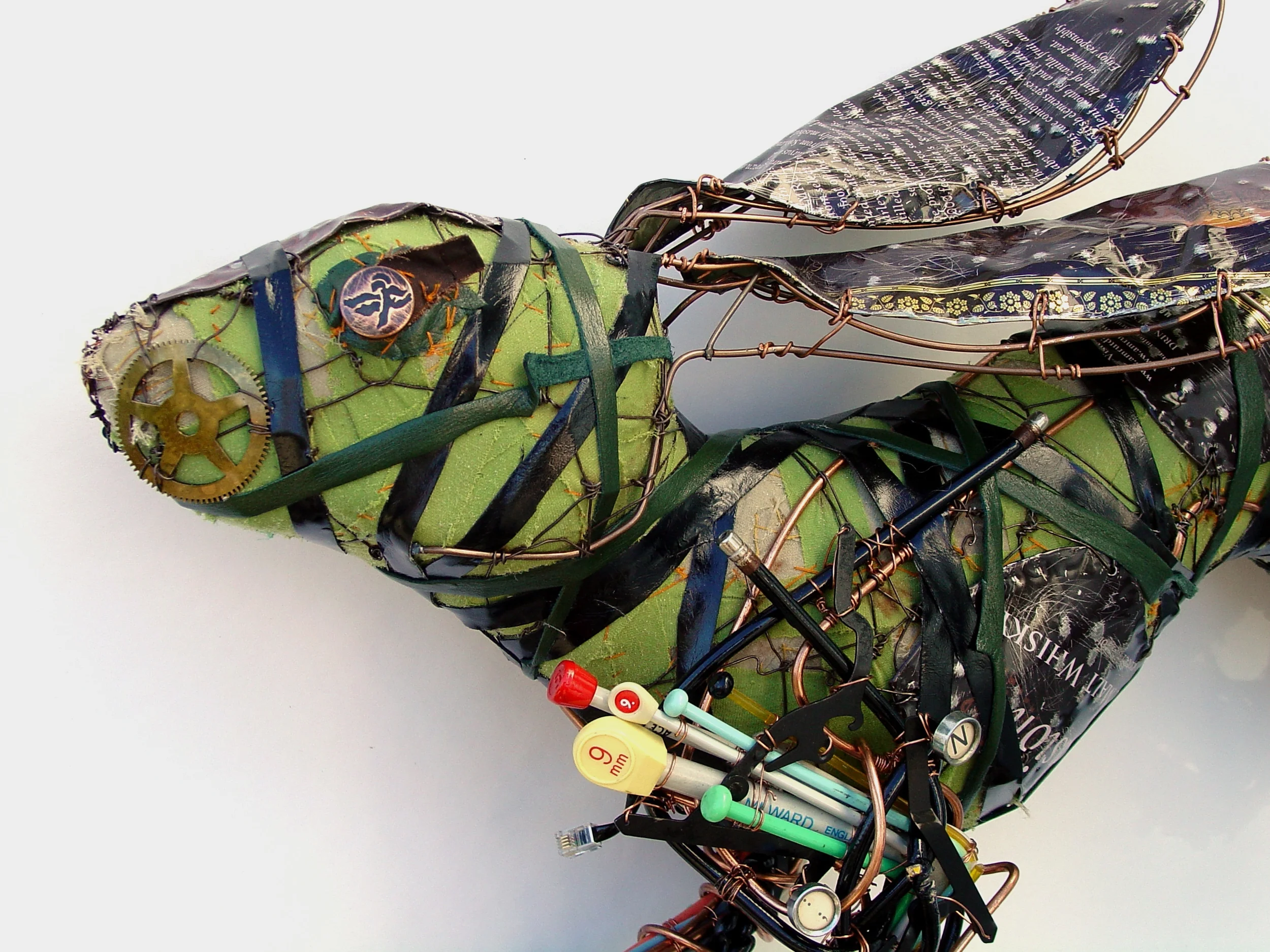  These two Hares can be displayed leaping or bounding across a wall.  They both measure approx 75cm long x 55cm high x 20cm deep, and are constructed out of a whole selection of found materials, ranging from blocks of wood, old fabrics, typewriter ke