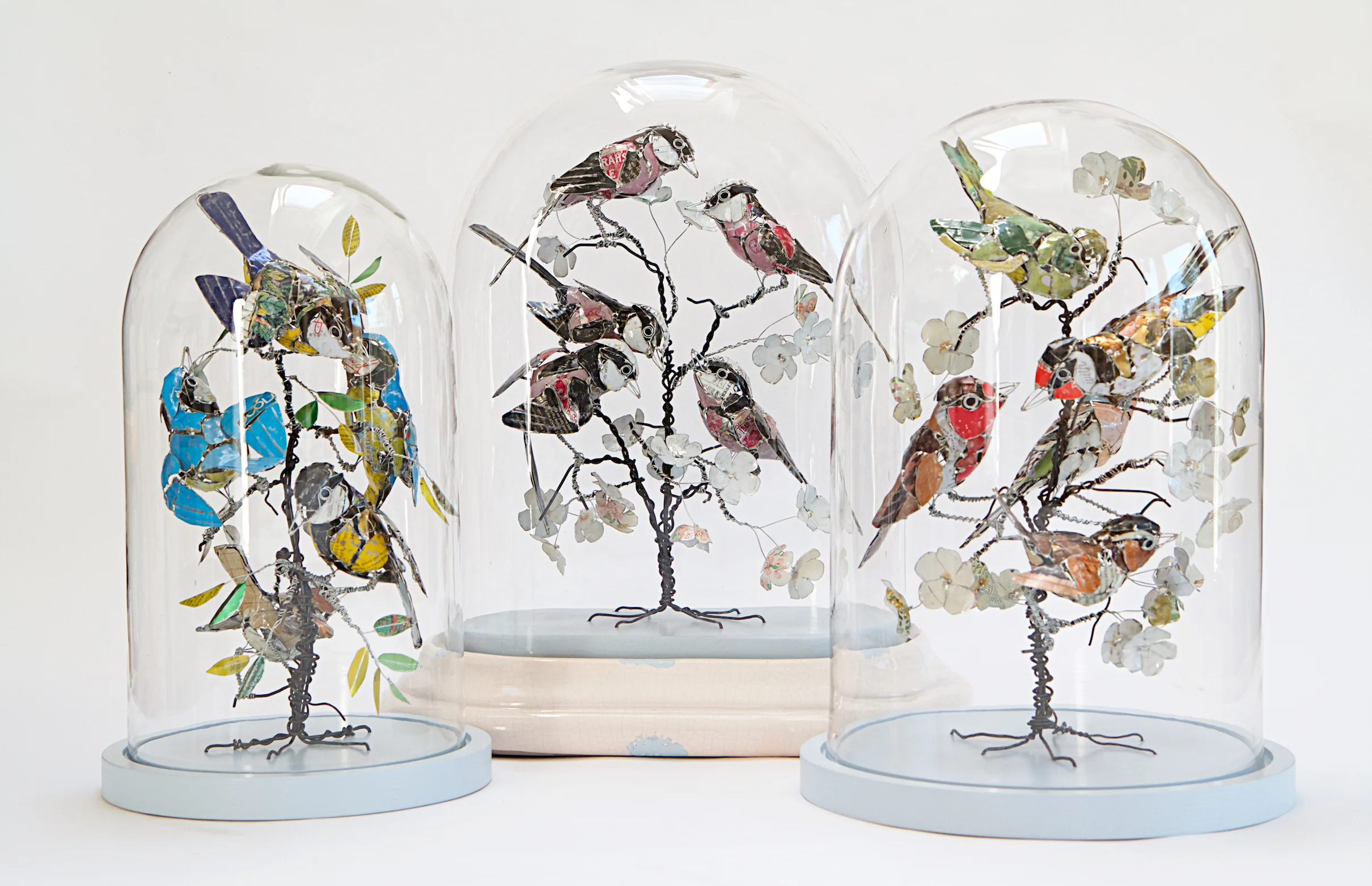 from the left:'If I keep a green bough in my heart, then the singing birds will come' 'Birds of a feather flock together'; 'Every bird loves to hear himself sing'