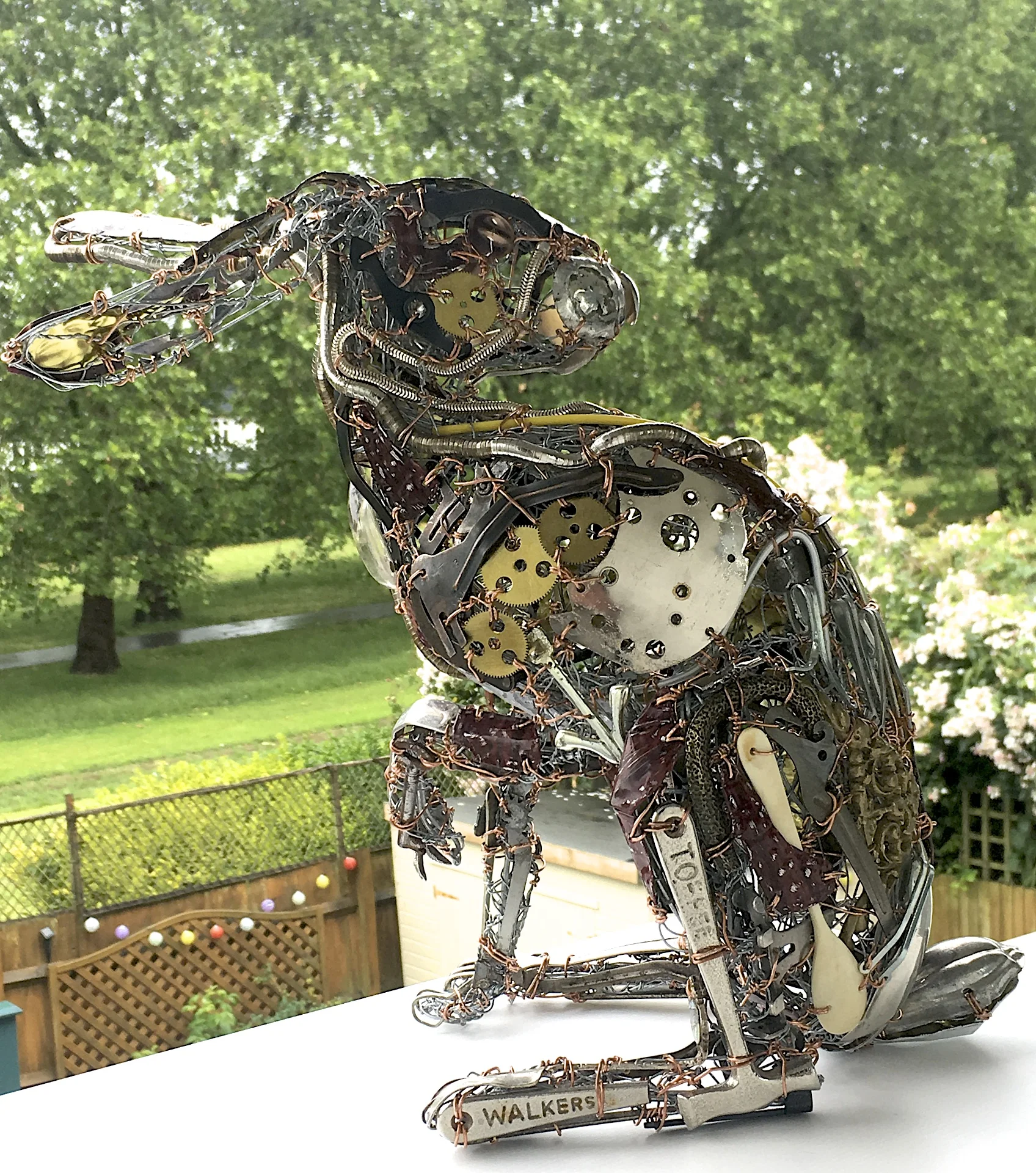 Possibly the Hare’s last view of greenery from my workroom window before being crated up for its journey