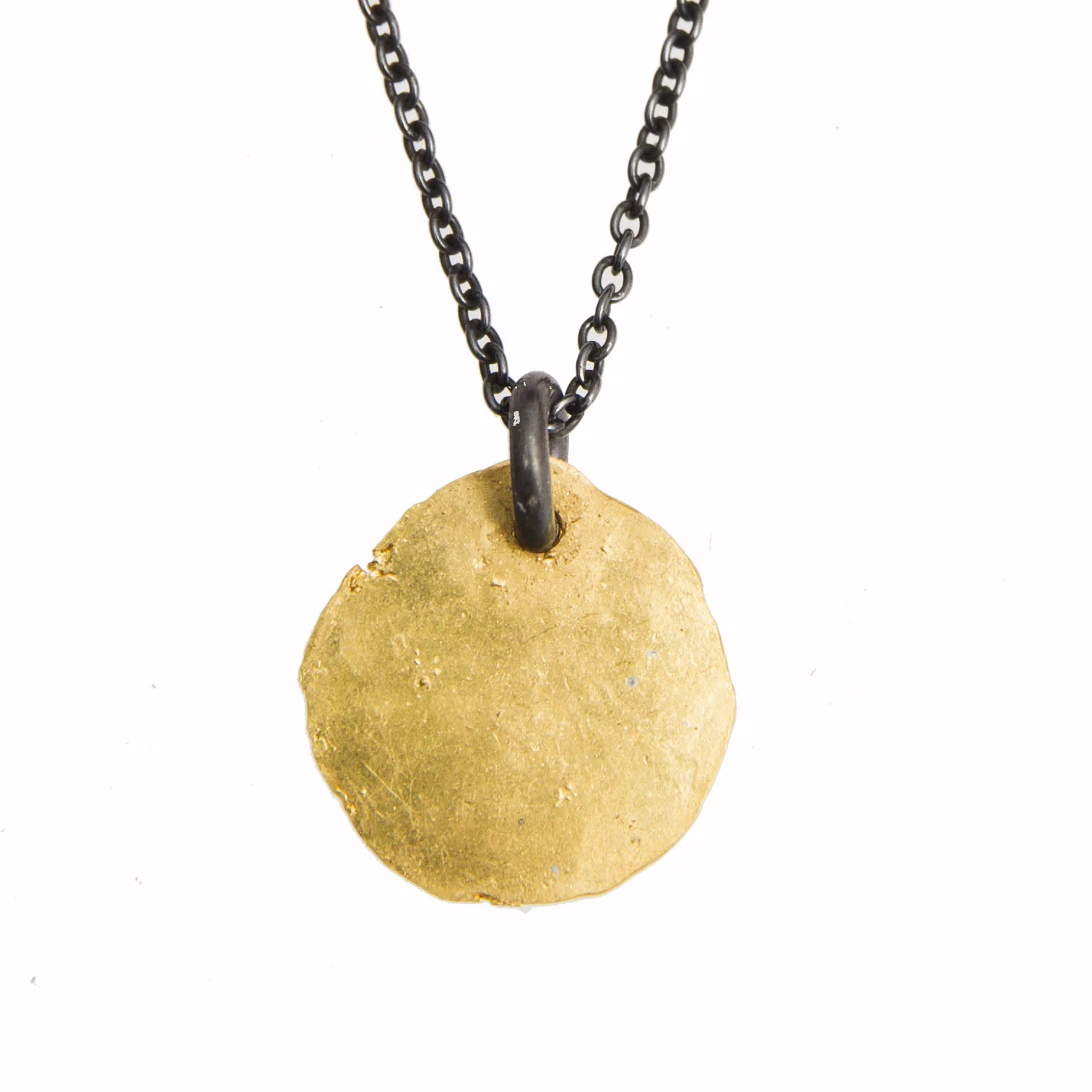 Old looking disc pendant
