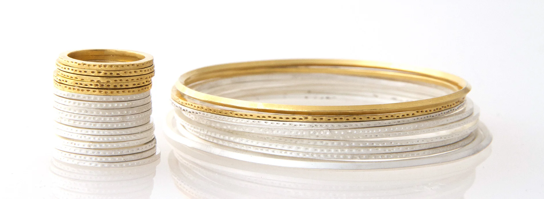 Whitened silver rings and bangles with 18ct gold friends from our ‘Archaeology’ collection