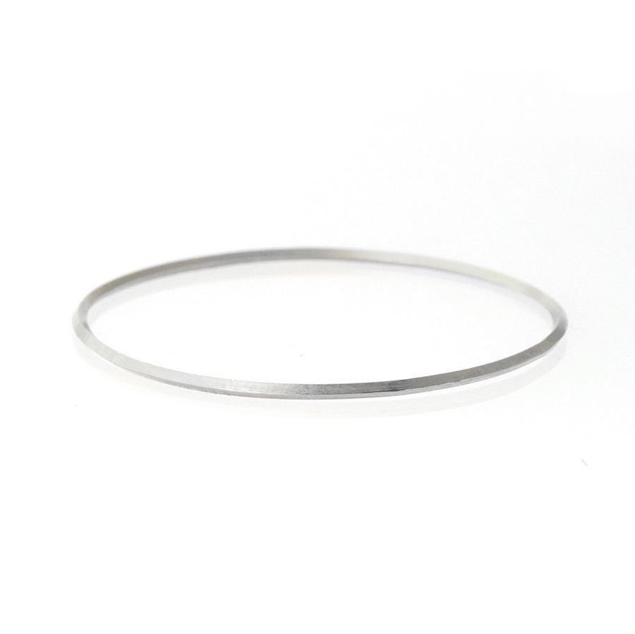 oblique+bangle+sidesizedgreygold.jpg